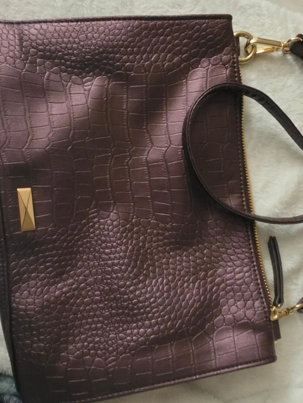 Burgundy crocodile textured leather crossbody bag with gold hardware